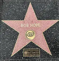 Bob Hope's live performance star with a rectangular plaque below it that reads "The Hollywood Chamber of Commerce / honors / BOB HOPE / Hollywood's Citizen of the Century