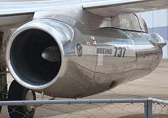 Original 737 with JT8D engine mounted under the wing with original cowling design