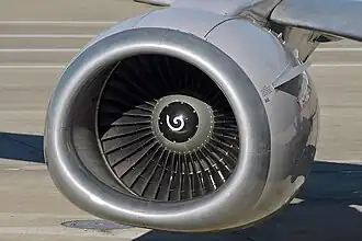 737 Classic with larger CFM56 engine mounted mostly ahead of the wing with an ovoid "hamster pouch" inlet with a flattened bottom
