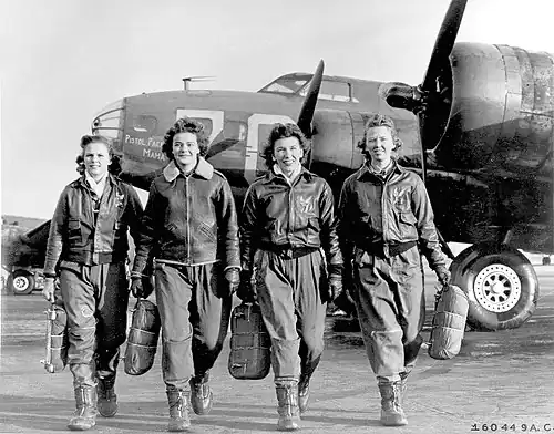 Members of the Women Airforce Service Pilots (WASP), who have been trained to ferry the B-17 Flying Fortresses, are pictured leaving their ship at the four engine school at Lockbourne Army Air Field during World War II, 1944