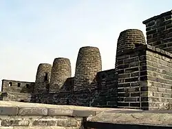 From the wall