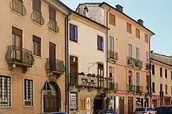 Street view showing early 20th-century residential buildings.