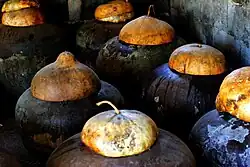 Traditional burnay jars containing fermenting bagoong in Ilocos Norte