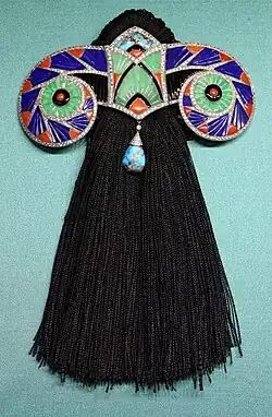 Art Deco stomacher, by Boucheron, 1925, gold, lapis lazuli, coral, jade, onyx, turquoise, rhinestones, unknown location