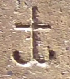 Kya (vertical assembly of consonants "Ka" and "Ya" ), as in "Sa-kya-mu-nī " ( 𑀲𑀓𑁆𑀬𑀫𑀼𑀦𑀻, "Sage of the Shakyas")