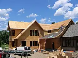 Constructing the library extension's wooden structure
