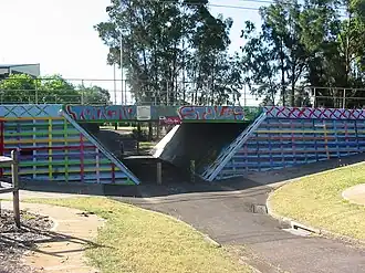 Road bridge on the cycleway passing Blackett Primary School, showing artwork