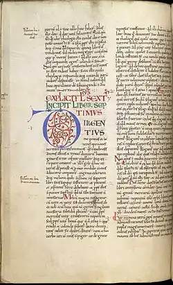 A page from a centuries-old hand-written codex with a large initial letter in the text