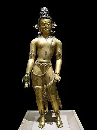 Room 33 – Statue of Bodhisattva Avalokiteshvara, gilded bronze. Nepal, 16th century AD