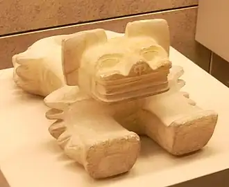 Alabaster statue of an ocelot from Teotihuacan, 5th–6th centuries, possibly a ritual container to receive sacrificed human hearts (British Museum)[129]
