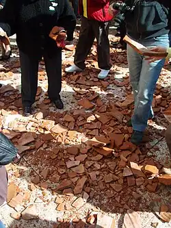 Image 49Shards of pottery vases on the street, after being thrown from the windows of nearby houses. A Holy Saturday tradition in Corfu. (from Culture of Greece)
