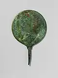 A bronze mirror, of the type associated with Venus