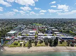 Aerial shot of Browns Bay from the east