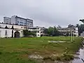 Interior view of the college and the tall building is the Kushtia District Council Supermarket