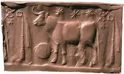 Cylinder seal impression: bull associated with pictographs represented in artistic form: the rising sun (UD), the setting sun (SIG), the religious festival (EZEN) and the emblem of the goddess Inanna (MUŠ3). This sequence can be interpreted as meaning "festival of the morning star and the evening star", i.e., a festival of Inanna, who is identified with the planet Venus. Former Erlenmeyer collection - Berlin.