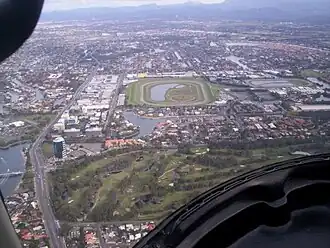 Aerial view of Bundall from the north looking south (racecourse centre, sewerage works right), 2005