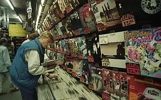 Choosing music from a record store (West Germany, 1988)