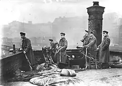 German soldiers during the Spartacist uprising occupying the Silesian train station in Berlin with an MG 01 and MG 08, 1919.