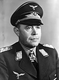 Head-and-shoulders portrait of a uniformed Nazi German air force general in his 50s wearing an Iron Cross