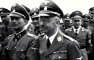 Photo of the 1941 SS tour of the Mauthausen concentration camp led by Heinrich Himmler; Otto Kumm (shown in front row, left), Wilhelm Bittrich and Paul Hausser took part in the tour