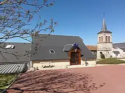 The town hall and church in Bussières