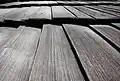 Close-up view of shingles on the Church of Exaltation of the Cross in Bystřice, Frýdek-Místek District, Moravian-Silesian Region, Czech Republic)