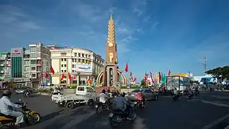 The Monument in downtown Cà Mau City, surrounded with the Provincial Administrative Hall, the Central Post Office and several banks