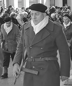 Comedian in beret at parade re-enactment on November 11, 2013 (70th anniversary).