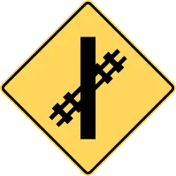 Skewed railway crossing ahead