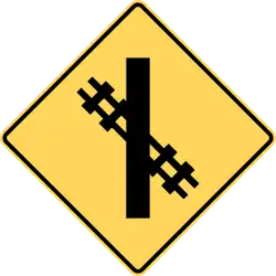 Skewed railway crossing ahead
