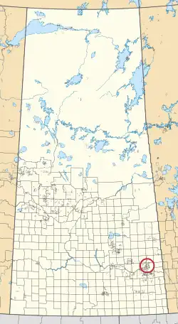A map of the province of Saskatchewan showing 297 rural municipalities and hundreds of small Indian reserves. One is highlighted with a red circle.