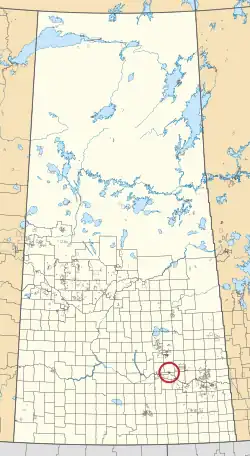 A map of the province of Saskatchewan showing 297 rural municipalities and hundreds of small Indian reserves. One is highlighted with a red circle.