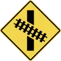 Skewed railway crossing ahead