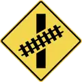 Skewed railway crossing ahead