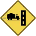 Heavy vehicles entering from left