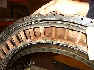 CFM56 turbine nozzle guide vanes. The area for the combustor gas flow for the complete ring of vanes at the narrowest part of the passage is known as the turbine area. When the vane trailing edges deteriorate the area increases and the engine runs hotter, which causes increasingly rapid deterioration, and uses more fuel to reach take-off thrust.[152]
