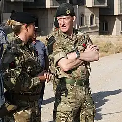 United Kingdom Maj. Gen. Rupert Jones, Deputy Commander – Strategy and Support, Combined Joint Task Force – Operation Inherent Resolve, (CJTF-OIR),speaks with a British explosive ordnance disposal trainer during a visit near Erbil, Iraq, 7 November 2016. CJTF-OIR is a multinational effort to weaken and destroy Islamic State in Iraq and the Levant operations in the Middle East region and around the world. (US Army photo by Sgt. Lisa Soy)