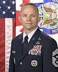 John G. Storms[18]