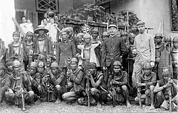 A band of Nias headhunters submitting to the Dutch