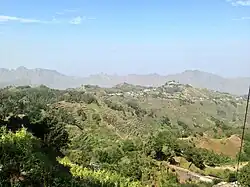 The center of the village with the northernmost mountains of the island