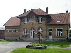 The town hall and school of Cachy
