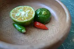 Labuyo chilis and calamansi, ingredients for (sawsawan)