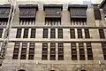 The facade of the upper floors around the courtyard