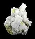 Several well formed milky white casts, made up of many small sharp calcite crystals, from the sulfur mines at Agrigento, Sicily
