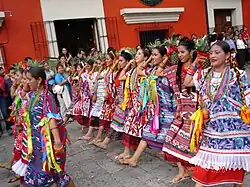 Oaxacan women on parade in traditional apparel