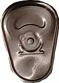 An aluminum soda can opening mechanism viewed from the inside of the can.