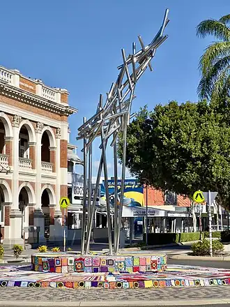 Cane Fire sculpture in front of the former Queensland National Bank, 2023