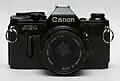 Black model with 50&nbsp;mm f/1.8