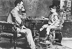 Image 3Capablanca playing chess with his father José María Capablanca in 1892 (from Culture of Cuba)