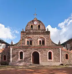 Exterior front of a stone church